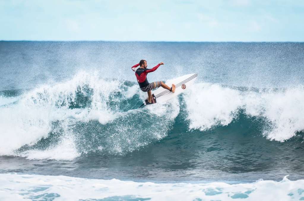 A guy surfing 