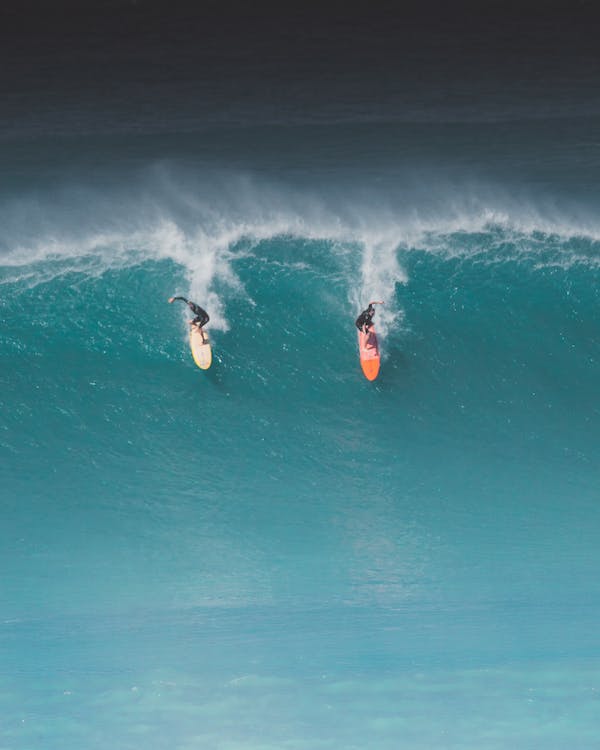 Two men surfing 